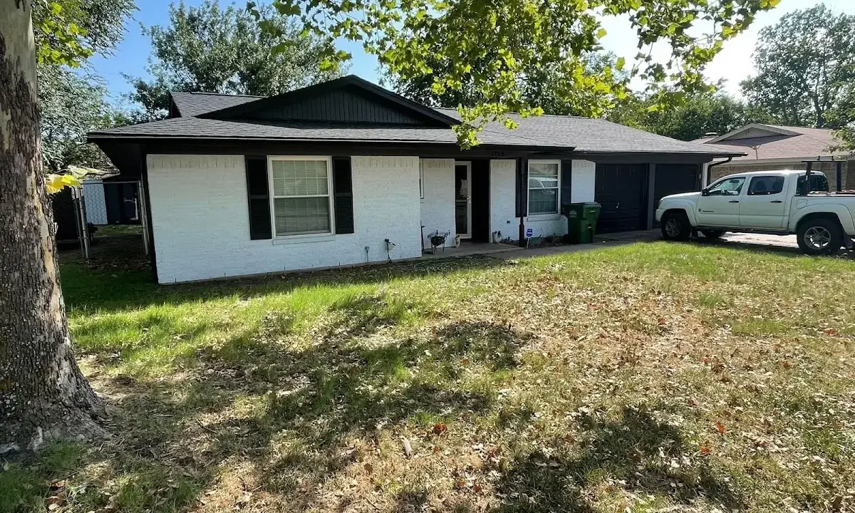 Professional roofing crew working on a residential roof in Palos Heights